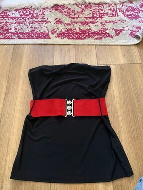 Lipstick Boutique black garment with pink label